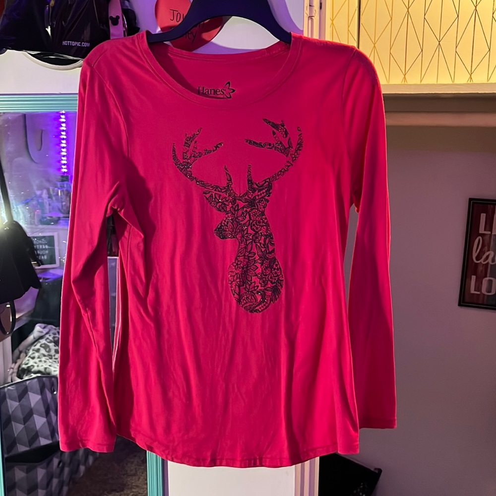 pink long sleeve shirt. Deer on the front lace and  sparkly. The back is blank.